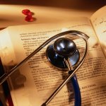 Stethoscope and medical book